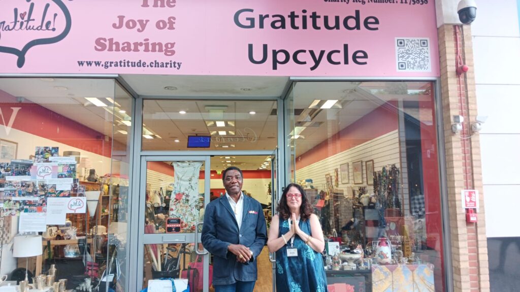 Picture of Sheila welcoming mayor of Borehamwood outside the Gratitude Upcycle Store